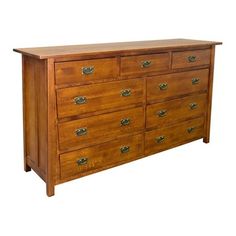 a large wooden dresser with many drawers on it's sides and two doors at the top