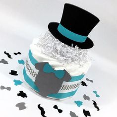 a cupcake with frosting and a top hat on it