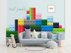 a living room with lego blocks on the wall