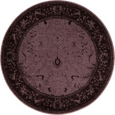 a round rug with an ornate design on the center and bottom, in dark purple