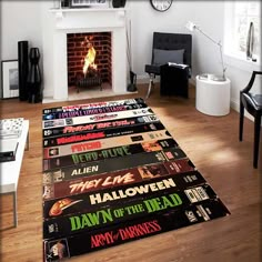 a living room with a fire place and lots of books on the floor in front of it