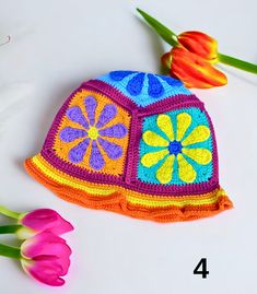 I have hand-knitted the granny square motif hats for you in the most beautiful colors of this season.       I can customize these hand-knitted berets in the colors you want, which will reflect your holiday colors and bohemian style, complement your clothes with their colors and be stylish at the same time. For this, just contact me.      If you are looking for a gift for your loved ones, these festival berets will be a great gift. Measurement The model's height is 1.65 cm and its head size is M. Festival Hand-knitted Brimmed Crochet Hat, Multicolor Crochet Festival Cap, Novelty Crochet Cap Hat, One Size Fits Most, Whimsical Multicolor Hand-knitted Crochet Hat, Summer Multicolor Flower-shaped Hat, Knitted Beret, Boho Hat, Festival Hat, Holiday Colors