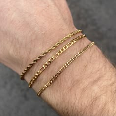 Gold Mens Bracelet Chains - minimalist style. Available in 2.5mm Rope / 3mm Figaro / 2mm Curb A Gold Bracelet perfect daily wear & ideal Bracelet chain as a gift For man & woman. ✅Twistedpendant's premium Quality Stainless Steel, Guaranteed to Never fade ✅3mm Thickness perfect for Daily wear! - please leave a note in the personalisation section for the size needed. We cannot personalise or engrave this chain. ✅High quality polished finish ✅ 100% Guaranteed to never fade! ✅Lobster claw Clasp for Minimalist Rope Chain Bracelets, Minimalist Rope Chain Bracelets For Everyday, Minimalist Rope Chain Bracelet For Everyday, Man Gold Bracelet Design, Gold Arm Band, 18k Gold Bracelet, Chain For Men, Bracelets Design, Gold Rope Chains