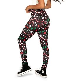 Give ‘em what they came for - the holiday goods. Show off everything the best gift bags give away in the Holiday Goodies High Waisted Leggings! Candy canes, holiday strings of lights, ornaments, snowflakes - need we say more? Everything else you could possibly need will be packaged pretty with a bow under your tree. Until that moment, stay comfortable and lounge in these leggings. Holiday Clothes, Black Candy, Tipsy Elves, Holiday Goodies, Christmas Outfits Women, Baddie Tips, Christmas Leggings, Candy Canes, Say More