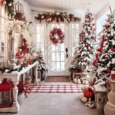 christmas trees and decorations in front of a white door with red trimmings on the windowsill