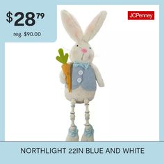 a stuffed rabbit with a carrot in its hand and the price is $ 28 99