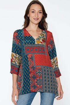 Our Ananda Tunics are made with 100% Cupro material, which is a luxurious, sustainable fabric that is produced from repurposed cotton waste in a closed loop system. This elegant tunic top has the look and feel of silk, but the lightness, easy care, and breathability of cotton.  The print designs are inspired by sari prints in rich jewel tone colors, and these fair trade tunics are available in S/M and L/XL size. Patterned V-neck Rayon Tops, Bohemian V-neck Tops For Layering, Cotton Patchwork V-neck Blouse, Cotton V-neck Patchwork Blouse, Cotton V-neck Blouse With Patchwork, V-neck Cotton Blouse With Patchwork, Bohemian Rayon Relaxed Fit Tops, Bohemian Rayon Tops With Relaxed Fit, Bohemian Relaxed Fit Rayon Top