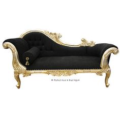 a black and gold chaise lounge chair