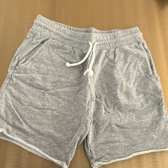 New Never Worn No Damages Rips Or Stains Gray Shorts H&M Casual Gray Bottoms With Built-in Shorts, Casual Bermuda Leisure Bottoms, Casual Loungewear Shorts With Short Inseam, Casual Shorts With Short Inseam For Leisure, Basic Shorts With Pockets, Casual Short Bottoms With Relaxed Fit, Casual Relaxed Fit Short Bottoms, Gray Casual Athletic Shorts For Loungewear, Basic Gray Bottoms For Summer