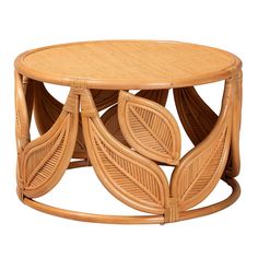 a wooden table with wicker leaves on the top and bottom, against a white background