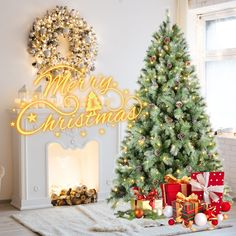 a decorated christmas tree in front of a fireplace with presents under it and merry lettering on the wall