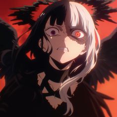 an anime character with red eyes and black wings on his head, staring at the camera