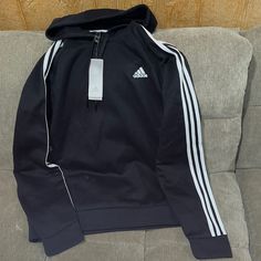 Brand New Adidas Hoody Large Black Fleece Adidas Hoodie, Black Hoodie With Three Stripes For Streetwear, White Three Stripes Branding Hoodie For Winter, Black Three Stripes Hoodie For Streetwear, White Three Stripes Hoodie For Winter, White Three Stripes Winter Hoodie, Black Adidas Three Stripes Sweatshirt For Winter, Black Adidas-style Winter Sweatshirt, Sporty Black Hoodie With Three Stripes