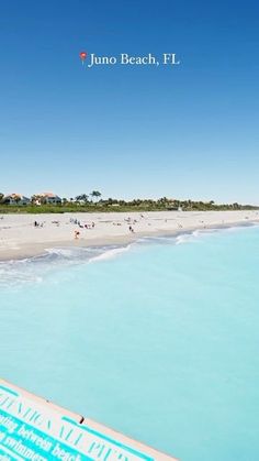 the beach is full of people and blue water