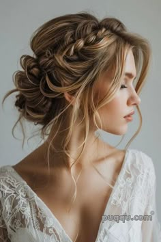 a woman with long hair wearing a white dress and braid in her hair, looking off to the side