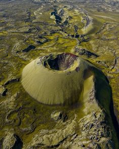 an aerial view of a crater in the middle of nowhere