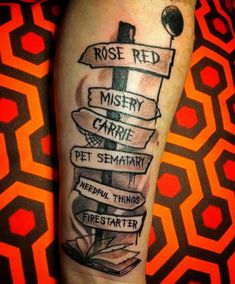 a person with a tattoo on their arm that reads rose red, misty carre, pet sematia and several different things