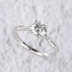 a white gold engagement ring with diamonds