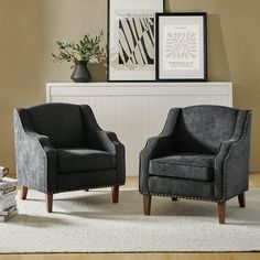 two chairs sitting next to each other in a living room