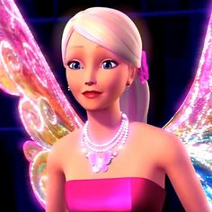 a barbie doll wearing a pink dress and pearl necklace with butterfly wings on her chest