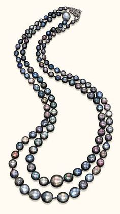 TWO EXTREMELY RARE SINGLE-STRAND BLACK PEARL NECKLACES, BY CARTIER AND BY JANESICH The first, of sixty graduated black pearls measuring approximately from 5.55 to 14.40 mm.; the second, of seventy graduated black pearls measuring approximately from 4.70 to 13.20 mm. to the diamond-set ribbon bow clasp. With certificate 35254 dated 17/3/2000 from the SSEF Swiss Gemmological Institute stating that the pearls are natural and show no indications of artificial colour modification (2) Black Pearls Jewelry, Necklace Repair, Black Diamond Necklace, Black Pearl Necklace, Pearls Jewelry, Single Pearl, Black Pearls, Parachute Cord, Large Image