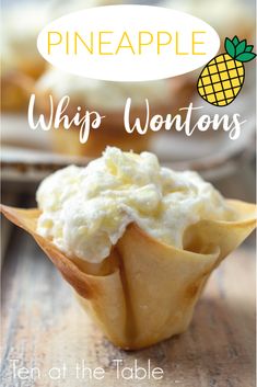 a pineapple cupcake with whipped cream on top and the title reads, pineapple whos wontons? ten at the table