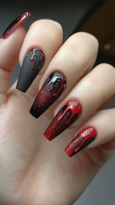 Add a touch of gore to your Halloween look with these Bloody Drips nails! Perfect for a chilling and dramatic effect on your costume. Click the pin and follow us for more spooky nail designs!  #HalloweenNails #BloodyNails #SpookyNails #NailArtDesigns #GoreNails Coffin Spooky Nails, Cute Vampire Nails, Halloween Inspired Nail Designs, Spooky Halloween Nails Acrylic Short, Black Nails With Blood Splatter, Halloween Coffin Shaped Nails, Red Nails For Halloween, Halloween Red And Black Nails, Jelly Halloween Nails