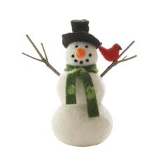 a small snowman with a red bird on it's head and green scarf