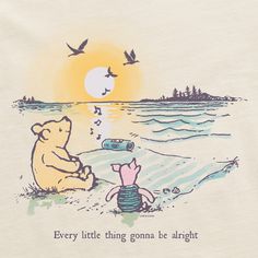 there is a t - shirt with an image of two bears on the beach