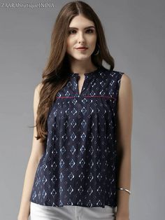 HAND CRAFTED TUNIC DESCRIPTION Navy printed woven A-line top, has a mandarin collar, sleeveless *Fabric:- 100% Cotton *Wash Care:- Hand-wash AVAILABLE IN 6 SIZES THEY ARE IN FOLLOWING MEASUREMENTS IN INCHES:- XS:- Bust-34/Length-25/Shoulder-13 S:- Bust-36/Length-25/Shoulder-13.5 M:- Bust-38/Length-25/Shoulder-14 L:- Bust-40/Length-25/Shoulder-14.5 XL:- Bust-42/Length-25/Shoulder-15 XXL:- Bust-44/Length-25/Shoulder-15.5 NOTE ►►CUSTOMISATION We do customisation ️ ►►TRACKING We give full tracking t Cotton Tops For Jeans, Trendy Cotton Tops, Top Designs For Women, Indian Tops