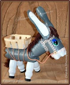 an inflatable donkey with a basket on its back