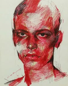 a drawing of a man's face is shown in red and black ink on white paper