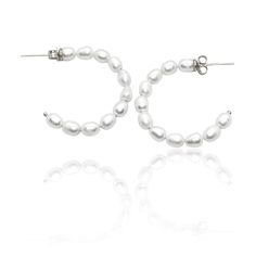 These freshwater pearl hoop earrings in sterling silver are a uniquely beautiful addition to any outfit. They are designed to elevate your style and add a touch of elegance to your look. Silver Small Hoop Pearl Earrings, Silver Small Hoop Pearl Earrings For Everyday, Everyday Sterling Silver Hoop Pearl Earrings, Minimalist Silver Hoop Pearl Earrings, Silver Small Hoop Earrings With Pearl Charm, Classic Silver Hoop Pearl Earrings, Small Silver Hoop Earrings With Pearl Charm, Classic Sterling Silver Hoop Pearl Earrings, Everyday Silver Earrings With Pearl Chain