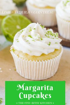 lime cupcakes with white frosting and sprinkles on a cutting board