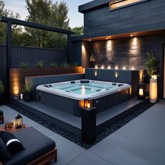 a large hot tub sitting on top of a patio