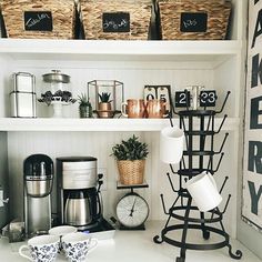 a kitchen shelf filled with coffee cups and other items