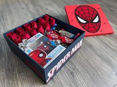 the spiderman box is open and ready for someone to take it home from school