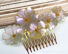 Handmade Hair Comb with large Pink-White iridescent flowers. The flowers are changing color from Pink to White while moving. Absolutely unique wedding or special occasion hair accessory.   The bouquet is about 4.5 inch length (10 cm) and 2.5 inch wide (7cm) attached to gold tone hair comb. The weight is 11 gr. The picture can't reproduce the flowers magic. This piece is graceful and exotic. Ready to ship in 2-3 days. Thank you for interest in my artwork. Alexandra. Iridescent Flowers, Hair Flower Accessories, Resin Wedding, Special Occasion Hair, Occasion Hair, Flowers Handmade, Flower Hair Pin, Girly Accessories, Tone Hair