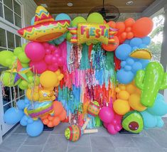 a bunch of balloons that are on the ground