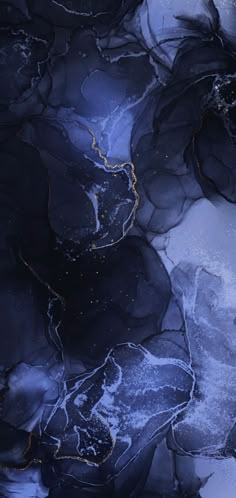 an abstract painting with black and gold paint on it's surface, as well as blue