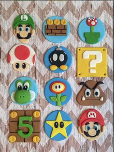 the cookies are decorated like mario bros characters