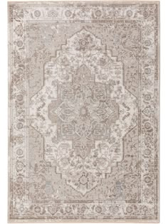 an area rug with beige and grey colors on the floor, including a large medallion design