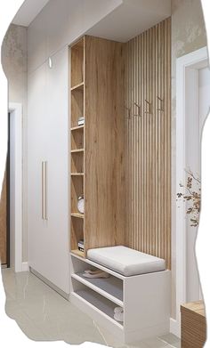 a white bench sitting in the middle of a room next to a book shelf and cabinets