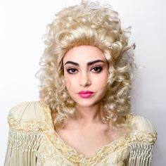 This is another favorite of ours for the big curly blonde look of our favorite icon, Dolly Parton! We'll include a wig cap with your purchase! All sales final. Diy Wig, Sparkle Gift, Wig Party, Sparkle Jewelry, Dolly Parton, Wig Cap, Colorful Makeup, Party Event, Curly Blonde