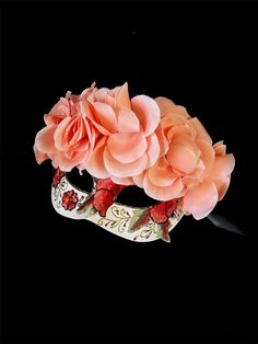 Embrace timeless beauty with this Floral Rose Mask featuring delicate peach flowers from the Vintage Bloom collection. Adorned with soft, blooming roses and embroidered floral detailing, this mask evokes a romantic and classic aesthetic perfect for masquerade balls, weddings, and garden parties. The intricate design blends vintage elegance with a modern flair, making it the ideal accessory for any occasion.

Age Group/Gender - Adult/Unisex

Size/Type - One size fits all adults

Mask Color - Whit Mardi Gras Kid, Kids Party Packs, Flower Mask, Rose Mask, Female Mask, Classic Aesthetic, Peach Flowers, Vintage Elegance, Garden Parties