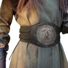 PRICES MAY VARY. 🌳 COOL DESIGN- Unique viking style wide belt, for the true viking warriors. Vintage buckles with embossed traditional patterns, bring you back to the viking age. Are you ready to unleash your rage?! 🌳 HIGH GRADE FAUX LEATHER-Handcrafted with the atmosphere of the times, Premium faux leather but has the touch and smell of genuine leather, cheaper and more protective than genuine leather. We love animals and all the living kinds! 🌳 ADJUSTABLE-One size for all. Suitable for most of the body shapes (waist length 94cm/37inch-130cm/51.18inch),If not, you do need more exercises my warrior. Comfortable and suitable any time any where. 🌳 FOR ANY OCCASIONS- Suitable for the LARP, Fantasy Events, Renaissance Faire, Comic Con, Halloween Cosplay Parties, Even for Daily Use. Drink a Wide Waist Belts For Women, Celtic Fashion Medieval, Renfest Accessories, Viking Clothes Women, Leather Burning Designs, Celtic Knight, Waist Armor, Fantasy Belt, Norse Clothing