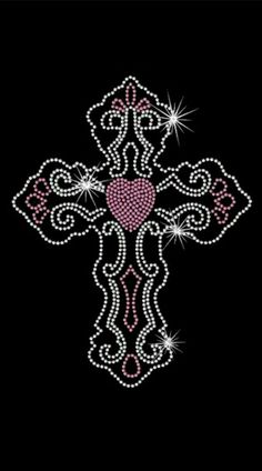 a cross with pink and white diamonds in the shape of a heart on a black background