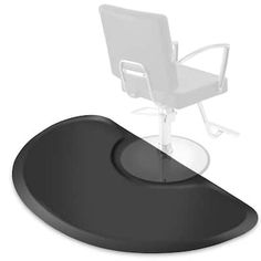 a chair that is sitting on top of a black table with a white chair in front of it