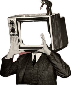 a man in a suit and tie holding up an old fashioned tv to his face