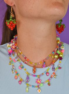 Ok, so this necklace is fun! And weird! Dare we say "kooky?" Each one is comprised of a jumble of beads - fruits, hearts, animals, faceted and miscellaneous. How It Works: Choose what charms you want on your necklace. Choose from 1, 3, 5, or 7 charms. For custom selection of charms, please type in the text box what charms you'd like. You can view all the charms by clicking the arrow on the right. Available on 16" or 18" long chain. Hand enameled bronze charms on multi-color beaded necklace. Each Susan Alexandra, Quoi Porter, Funky Jewelry, Text Box, Beaded Accessories, Jewelry Inspo, Dream Jewelry, Cute Jewelry, Clay Jewelry